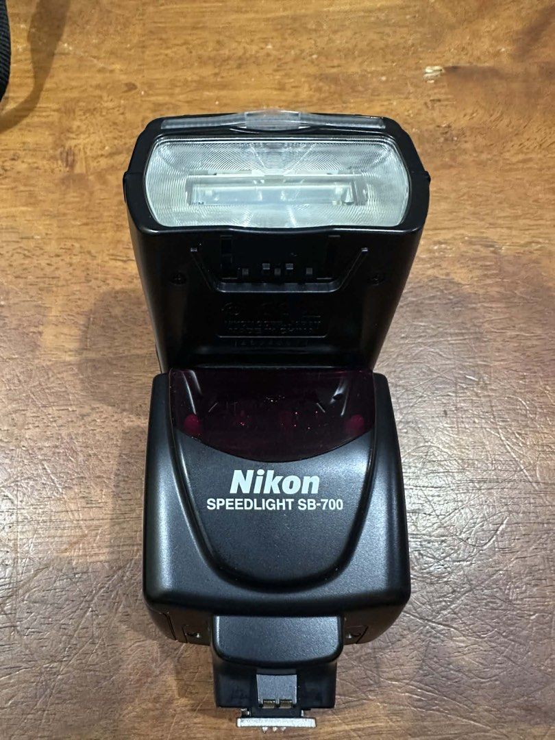 Nikon D90 DSLR Camera with Lens and Speedlight (Category: Cameras) located in Los Banos. Submitted by tripleceedoubletwo (Listing ID 1435711714, Image 2). Description: - Nikon D90 DSLR camera - Includes zoom lens - Speedlight SB-700 included - Comes with lens cap, camera strap, and lens hood - Perfect for photography enthusiasts - Ready to shoot.