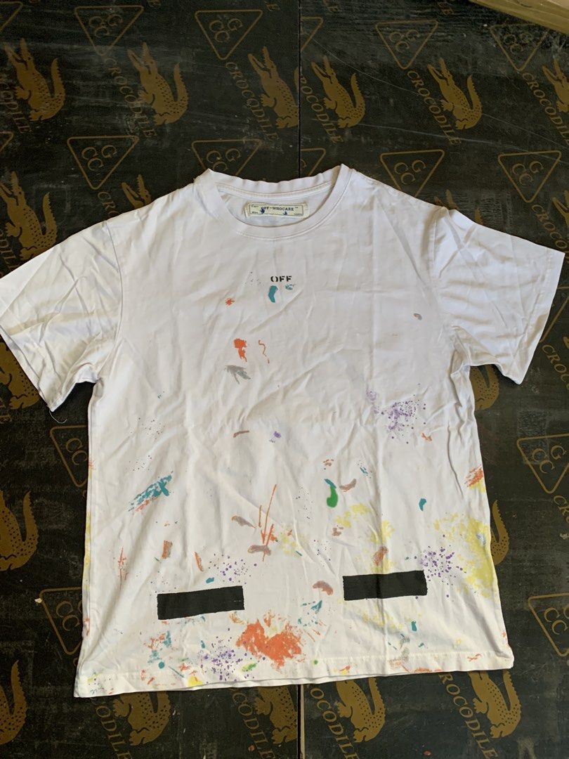 Off-White Paint Splatter T-shirt XS (Category: Tshirts & Polo Shirts ) located in Baguio. Submitted by brix6699 (Listing ID 1435606827, Image 1). Description: - Off-White T-shirt with paint splatter design - Features the iconic arrow logo on the back - "OFF" print on the front - Crew neck and short sleeves - Made from 100% cotton - Size: XS -no issues - Dimensions Length 25.5 inches Width 19.5 inches.