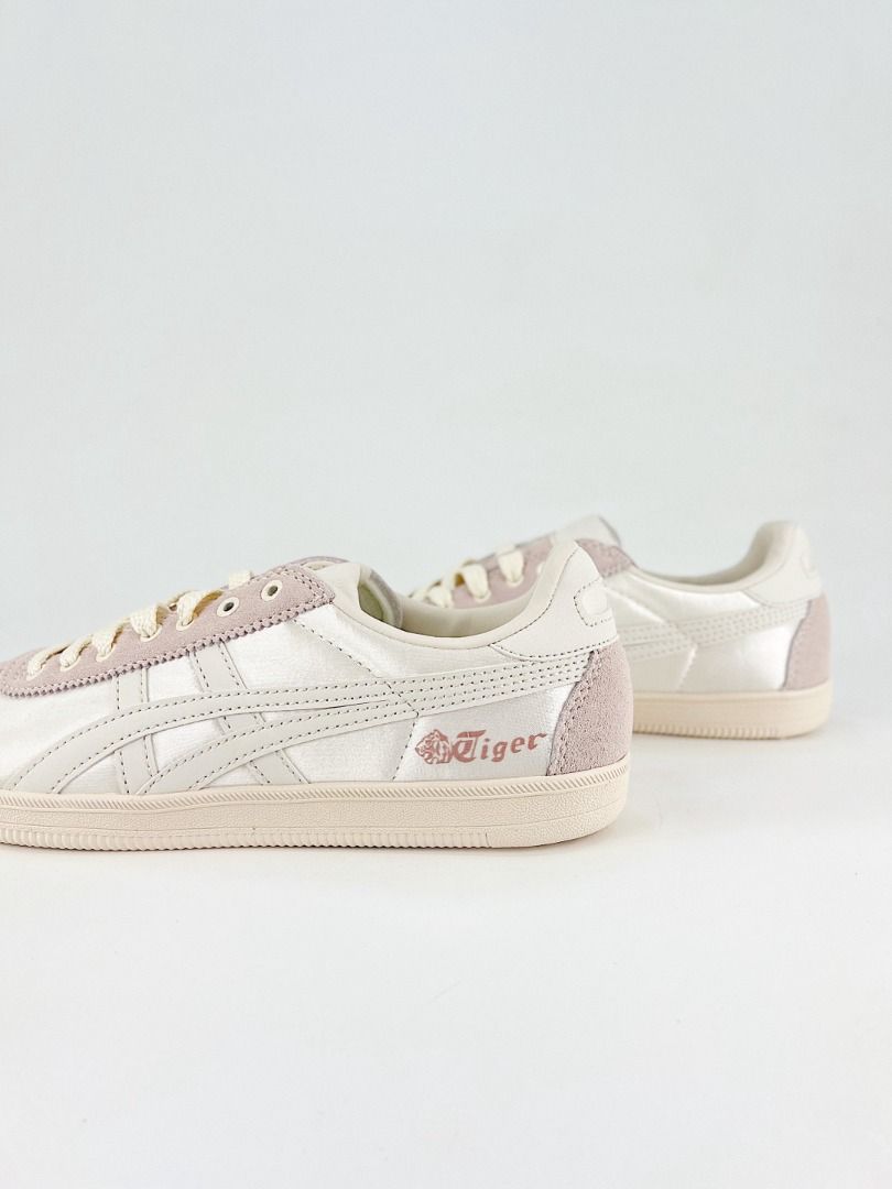 Onitsuka Tiger Tokuten Pink Satin Casual Sneakers (Category: Sneakers) located in Singapore. Submitted by creamycupcakes (Listing ID 1435707280, Image 3). Description: - Brand new Onitsuka Tiger Serrano sneakers - Color: Cream and Pink - Classic design with suede toe cap - Features iconic Tiger stripes - Comes with original box - Perfect for adding retro flair - Size: [Insert Size].