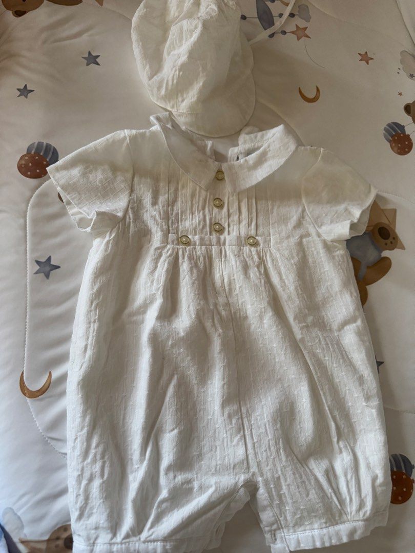 Periwinle Junior Baby Romper with Hat - 6M (Category: Babies & Kids Fashion) located in Manila. Submitted by tallyava (Listing ID 1435544767, Image 2). Description: - Periwinle Junior white baby romper set - Designed for 6-month-old babies - Includes romper and matching hat - Romper features: - Classic collar - Button details - Short sleeves - Textured fabric - Comfortable fit - Suitable for special occasions or everyday use.