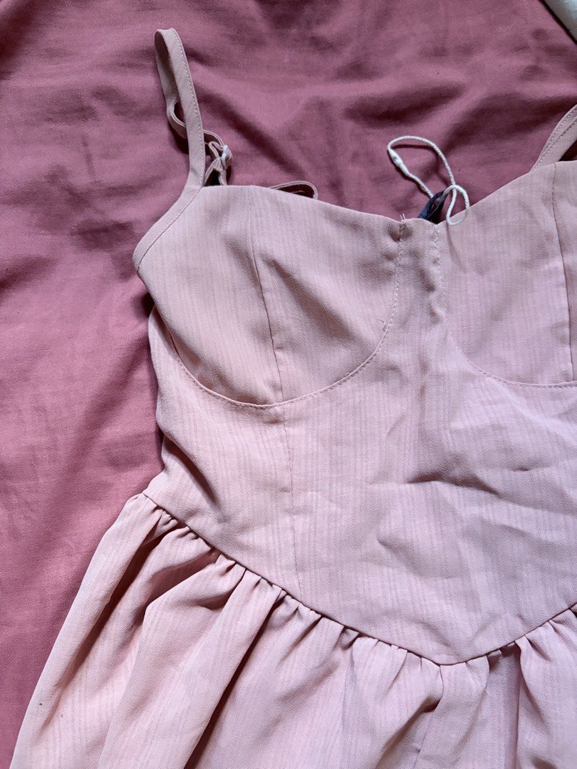 Pink Bustier Smocked-back Romper (S-M) (Category: Rompers) located in Meycauayan. Submitted by _cbear (Listing ID 1435655761, Image 1). Description: - Light pink - S to M - Bustier top with adjustable straps - Gathered shorts - Textured fabric - Never worn .