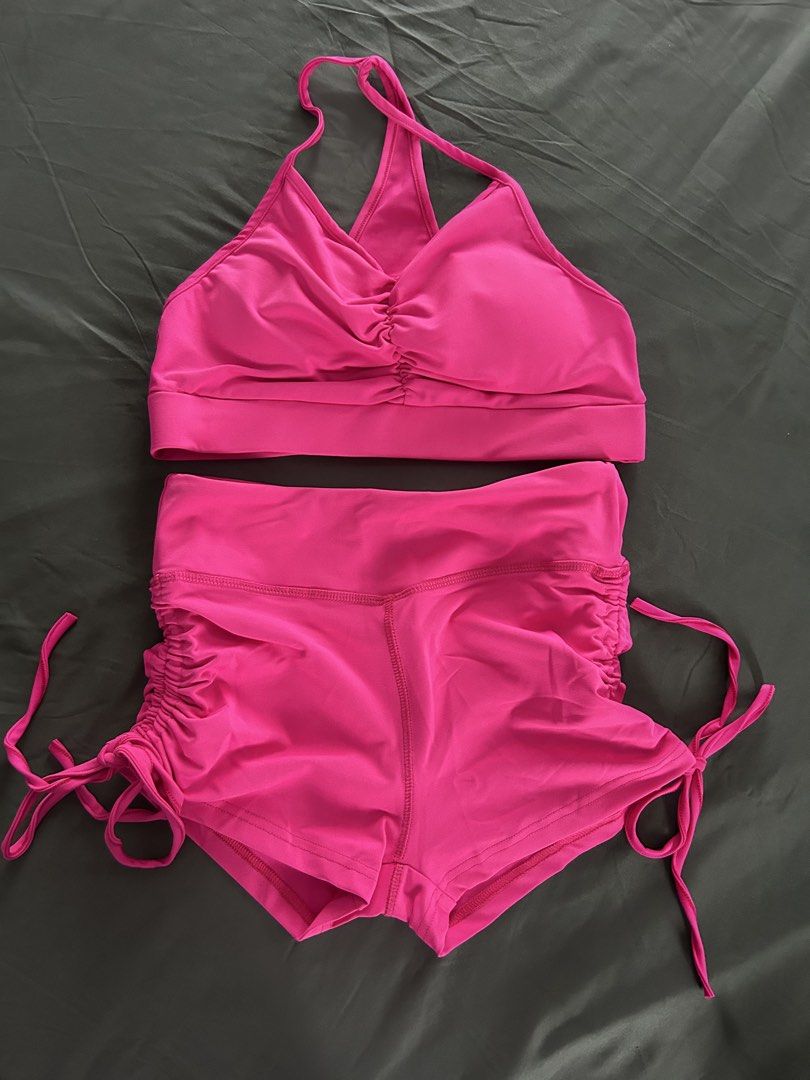 Pink Halter Top and Shorts Set (Category: Activewear) located in Antipolo. Submitted by cl026 (Listing ID 1435592047, Image 1). Description: Activewear set includes a halter top and matching shorts. The set is a vibrant pink color. The shorts have ruched detailing and adjustable ties. The fabric composition is 95% polyester and 5% spandex. The size is Large..