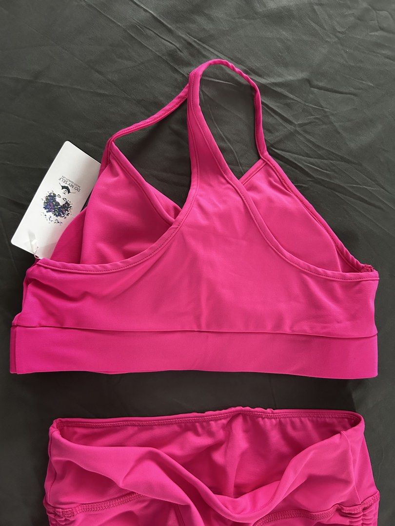 Pink Halter Top and Shorts Set (Category: Activewear) located in Antipolo. Submitted by cl026 (Listing ID 1435592047, Image 2). Description: Activewear set includes a halter top and matching shorts. The set is a vibrant pink color. The shorts have ruched detailing and adjustable ties. The fabric composition is 95% polyester and 5% spandex. The size is Large..