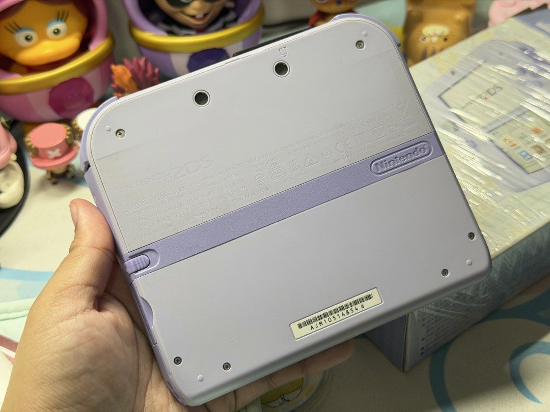 (PLS READ) Nintendo 2DS Purple / Lavender (Category: Nintendo) located in Quezon City. Submitted by maollows (Listing ID 1421753273, Image 2). Description: Nintendo 2DS Lavender/Purple Edition RARE COLOR ₱9,599 (NO MORE LAST PRICE) Messages asking for last price will be ignored ☑️ Box and manuals ☑️ Replacement Charger ☑️ Replacement stylus of the same color ☑️ Crystal case and screen protector installed ☑️ Free random DS game 💜 No functionality