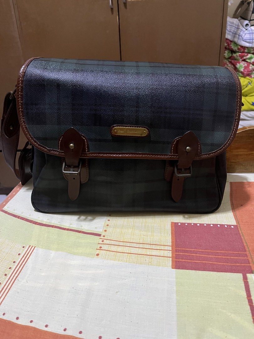 Polo Ralph Lauren Plaid Messenger Bag (Category: Luxury Bags & Wallets) located in Manila. Submitted by jankbaiteh05162 (Listing ID 1435604525, Image 1). Description: - Polo Ralph Lauren messenger bag - Plaid pattern - Flap closure with buckle straps - Brown leather shoulder strap and accents - Small logo tag Look new looks elegant.