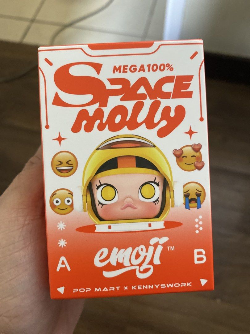 POP MART MEGA SPACE MOLLY 100% Emoji Series (Category: Designer & Blind Box Toys) located in Quezon City. Submitted by mg163 (Listing ID 1435540455, Image 1). Description: For sale Pop mart Brandnew Factory sealed POP MART MEGA SPACE MOLLY 100% Emoji Series figure. It features a Space Molly figure with an emoji theme. The box includes a warning about small parts and is suitable for ages 3 and up. The figure is from the POP MART x Kennyswork colla