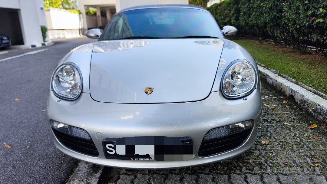 Porsche Boxster 2.7 Tip Auto (Category: Used Cars) located in Singapore. Submitted by sbn22p (Listing ID 1435534743, Image 2). Description: Experience a truly German made car and let the roof down and let the exhaust note entertain you. That's driving and fun. Option to buy with double digit car plate number. (See my other ads.) Upgraded Head unit. Upgraded Steering wheel. Electronic seats. Bose speakers. Alloy rims. Low mileage. Stock engine. St