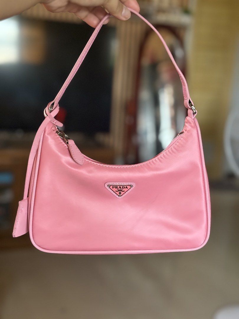 Prada Re-Edition 2000 Mini Bag - Pink (Category: Luxury Bags & Wallets) located in Manila. Submitted by maemey_botique23 (Listing ID 1435555666, Image 1). Description: - Authentic Prada Re-Edition 2000 Mini Bag - Lovely pink color - Sleek, curved design - Top handle - Small Prada logo - Includes matching detachable tag - Zipper closure - Stylish and compact - Perfect for everyday use.