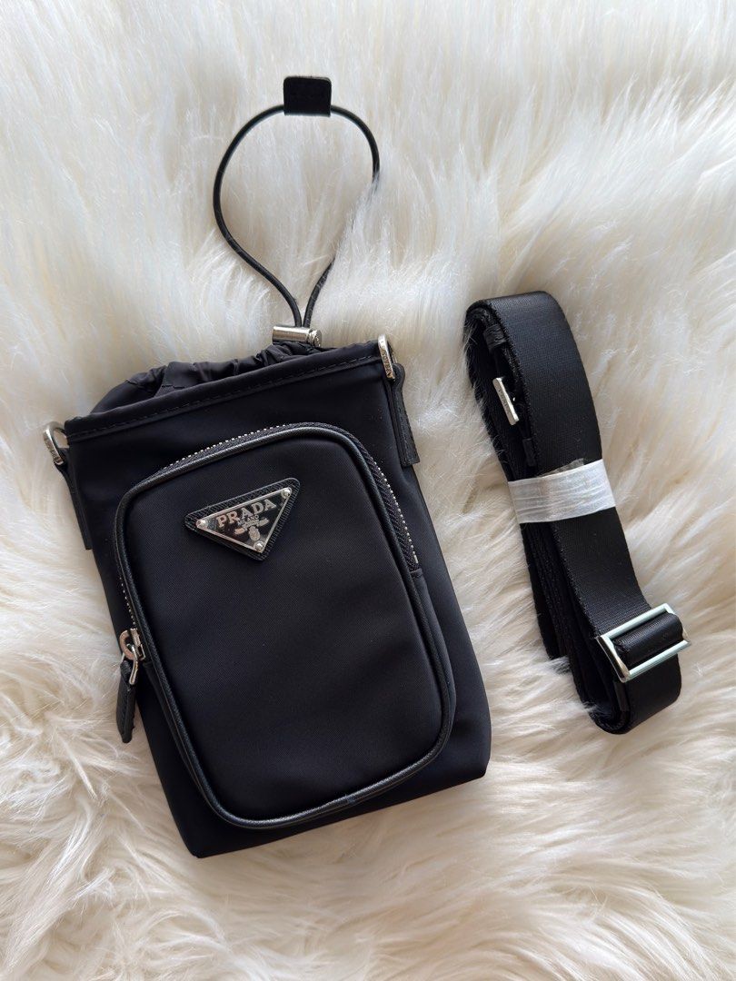 Prada Re-Nylon Cross-Body Phone Case (Category: Luxury Bags & Wallets) located in Manila. Submitted by shoulderfashion (Listing ID 1435602120, Image 1). Description: .