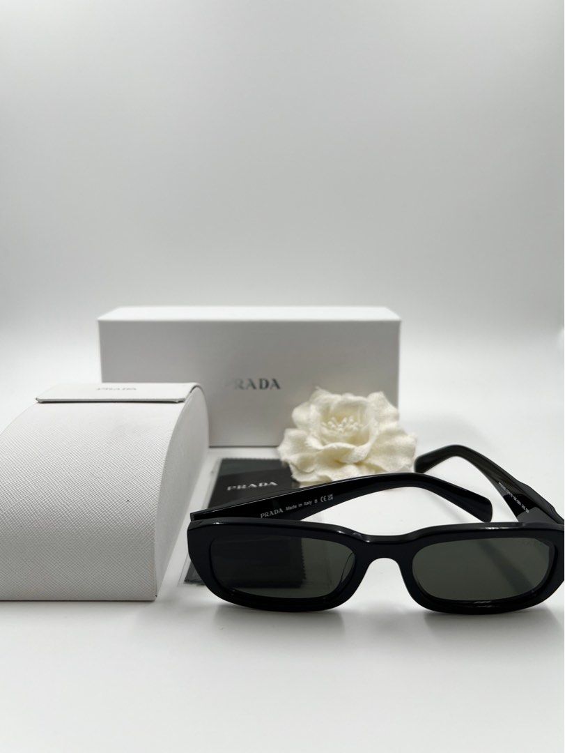 ⚜️Prada sunglass 🕶️ (Category: Luxury Accessories) located in Makati City. Submitted by 90sangel (Listing ID 1435678190, Image 2). Description: •Item: Prada Sunglass 🕶️ •Size: Standard fit Lens-nose-temple measurement: 53-19-145 mm •Condition: As New Acetate frame front - Color: Black Frame compatible with graduated lenses 100% UVA / UVB protection *2 stocks available - different packaging. - prada blue 12k - prada white 9k.