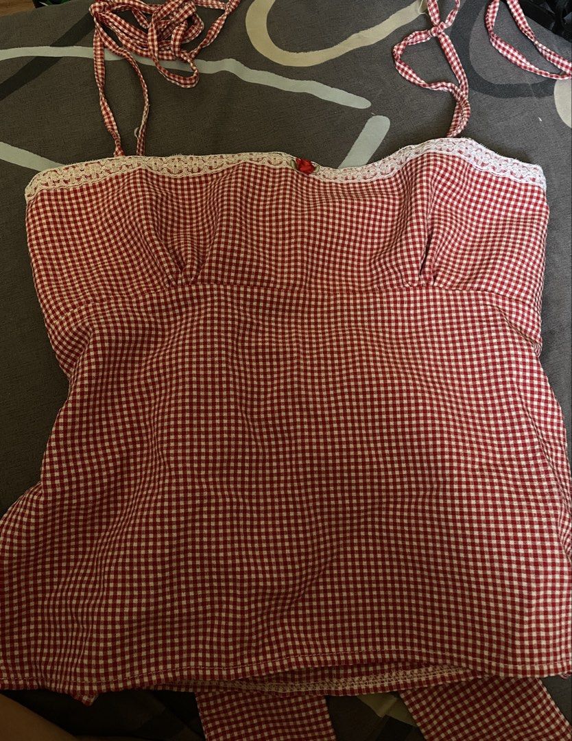 Red Gingham Sleeveless Top (Category: Sleeveless) located in General Trias. Submitted by sofiacoppoolaa (Listing ID 1435682973, Image 1). Description: this has bow tie at the back, u can freely adjust it to ur bust size 💘.