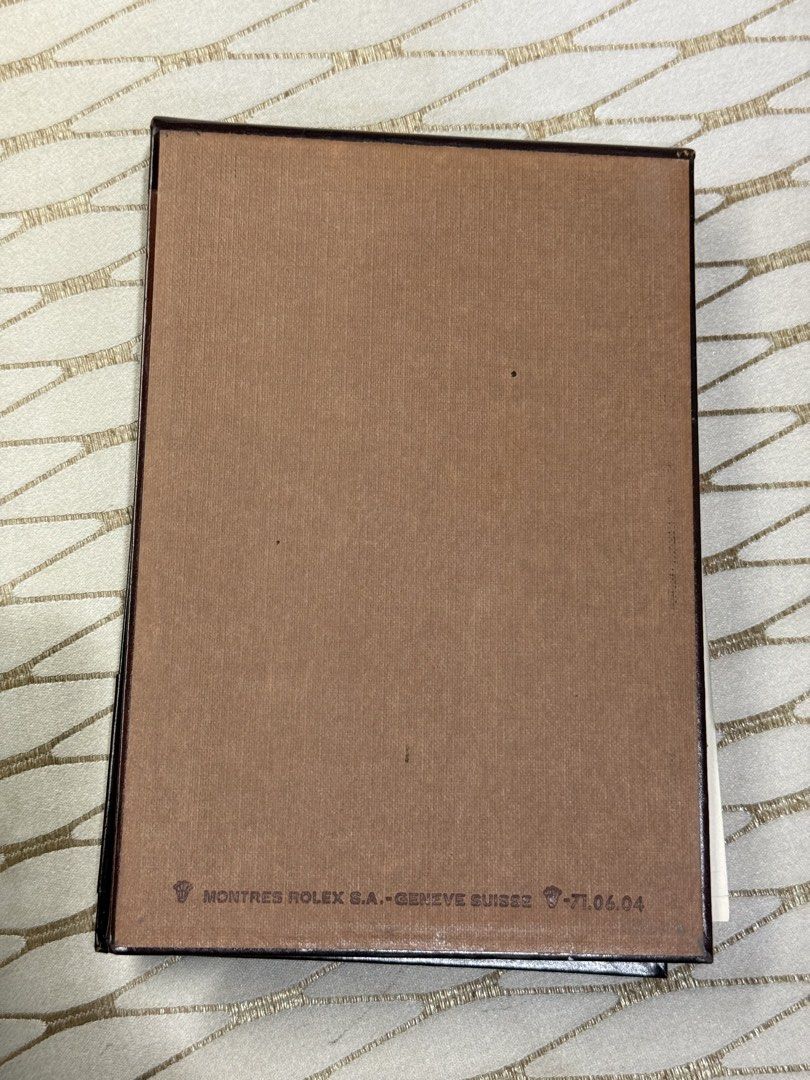 Rolex Leather Notebook (Category: Luxury Bags & Wallets) located in Pasay City. Submitted by alphaq21 (Listing ID 1435547932, Image 3). Description: Leather notebook from Rolex. It features a brown leather exterior with a buckle closure. The interior includes a notepad with the Rolex logo. The back of the notebook has the Rolex logo and the text "MONTRES ROLEX S.A. - GENEVE SUISSE - 71.06.04". Vintage Rolex Dealer’s Quote Leather Notepad Notebook