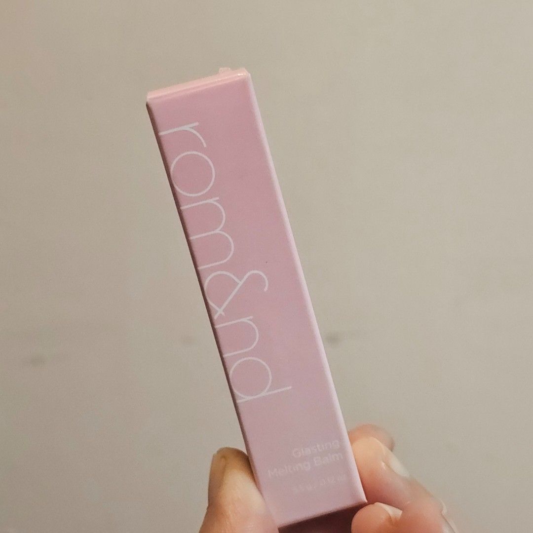 Rom&nd Glasting Melting Balm (#09 Peonies) (Category: Makeup) located in Makati City. Submitted by booksandskincare_corner (Listing ID 1435558127, Image 1). Description: - Last price posted, the items in my listing are already below SRP - 90% full - Swipe left to see product details - Bought directly from Korea - SRP: 400 - Expiry: 2027 April 01 - RFS: decluttering - MOP: GCash, Security Bank, BDO - Shipping: Lalamove within Metro Manila, LBC out