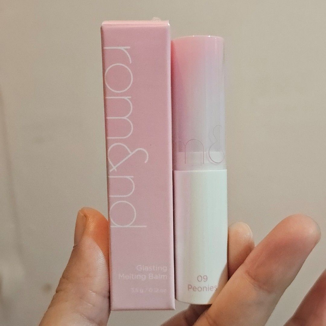 Rom&nd Glasting Melting Balm (#09 Peonies) (Category: Makeup) located in Makati City. Submitted by booksandskincare_corner (Listing ID 1435558127, Image 2). Description: - Last price posted, the items in my listing are already below SRP - 90% full - Swipe left to see product details - Bought directly from Korea - SRP: 400 - Expiry: 2027 April 01 - RFS: decluttering - MOP: GCash, Security Bank, BDO - Shipping: Lalamove within Metro Manila, LBC out