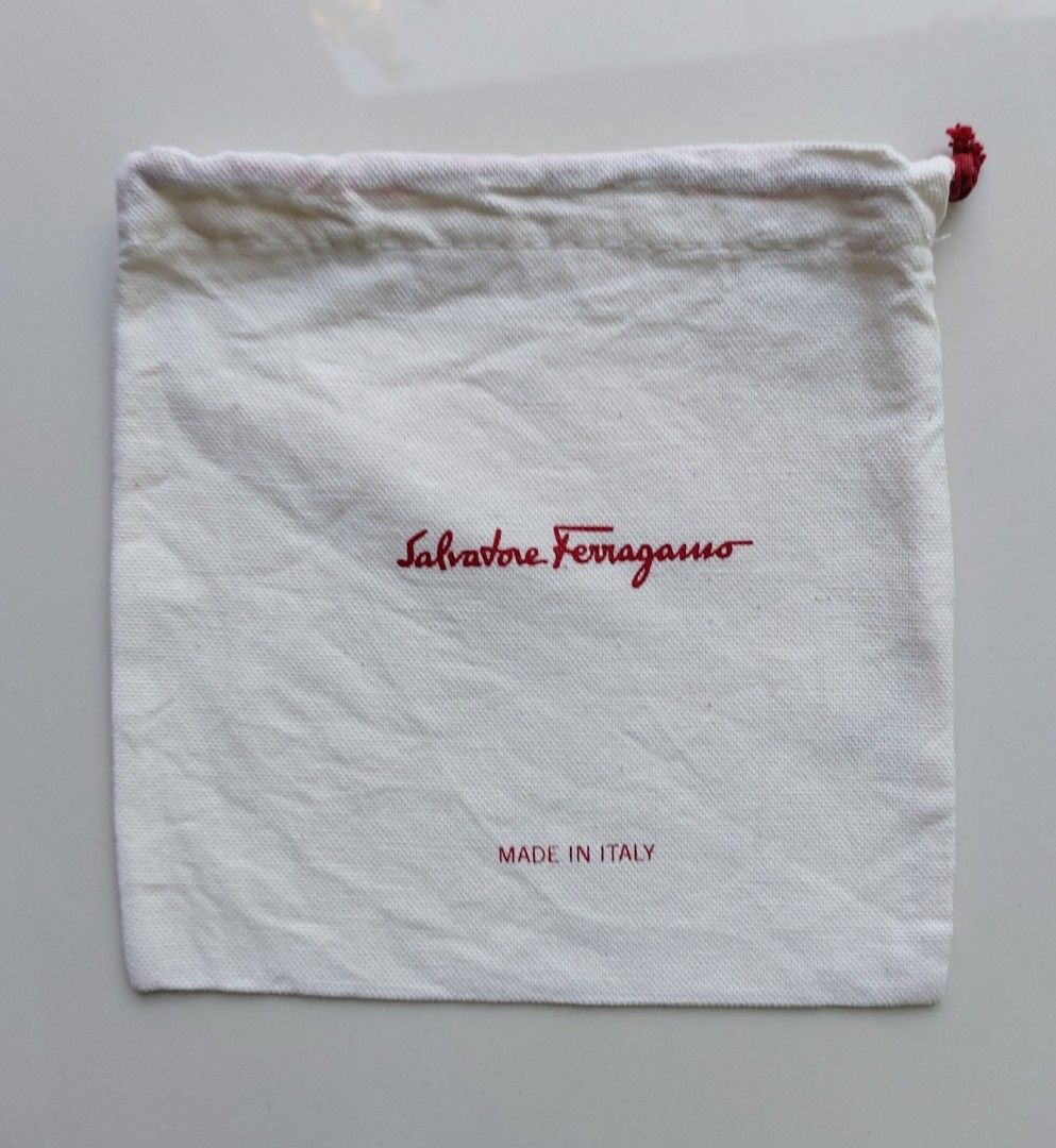 Salvatore Ferragamo Dust Bag (Category: Luxury Bags & Wallets) located in Lapu Lapu. Submitted by agnesapm_29813 (Listing ID 1435574567, Image 1). Description: - Authentic Salvatore Ferragamo dust bag - Made in Italy - Features the Salvatore Ferragamo logo in red - Measurements: 7 inches x 7 inches - Fabric: 100% cotone.