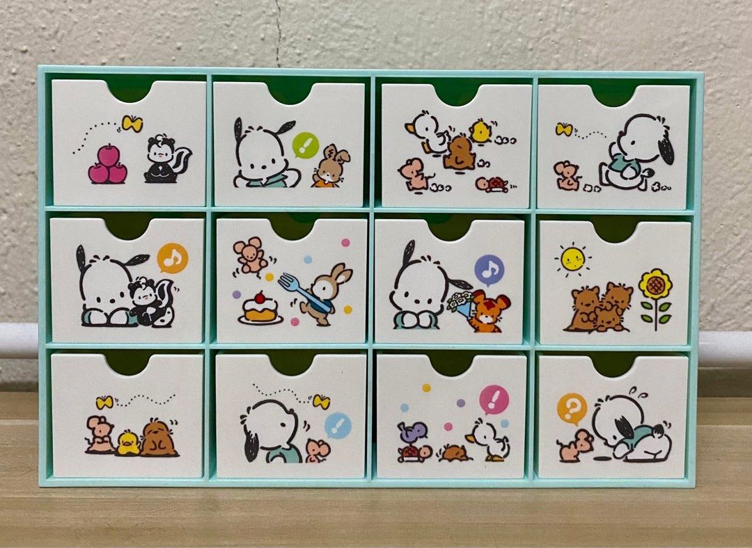 SANRIO Pochacco Mini Drawers (Reversible) (Category: Storage Boxes & Baskets) located in Pasig City. Submitted by foxy_cla_18 (Listing ID 1435584518, Image 1). Description: Sanrio Original Mini Drawers (Reversible) Width - 8.5 in Height - 5.25 in Depth - 2 in.