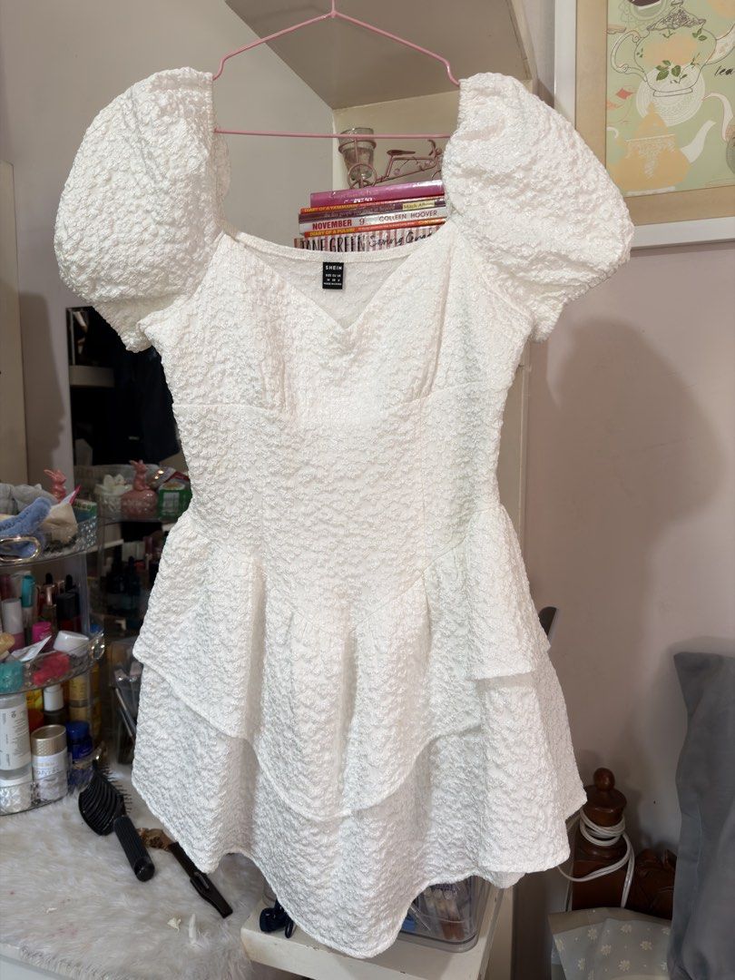 Shein White Puff Sleeve Dress (Category: Dresses) located in Apalit. Submitted by ic_declutter (Listing ID 1435591864, Image 1). Description: - Shein white dress - Features puff sleeves - Tiered skirt design - Square neckline - Size: M (EU 38, US 6) - Made in China.