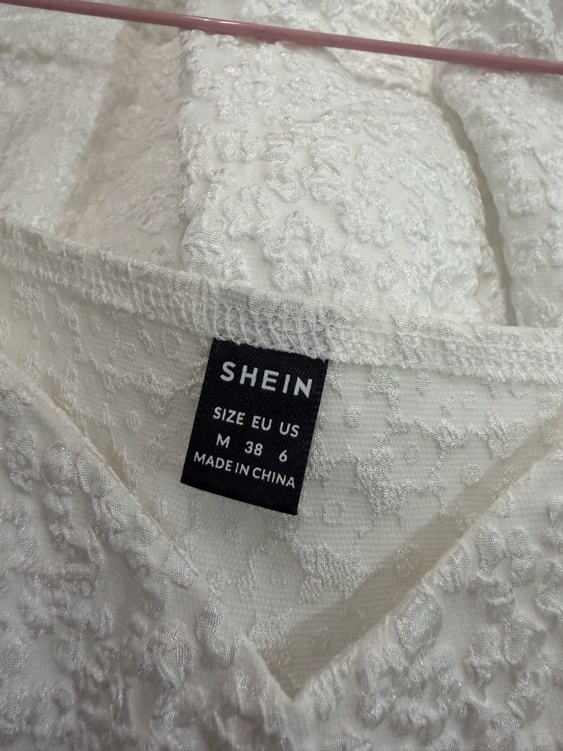 Shein White Puff Sleeve Dress (Category: Dresses) located in Apalit. Submitted by ic_declutter (Listing ID 1435591864, Image 3). Description: - Shein white dress - Features puff sleeves - Tiered skirt design - Square neckline - Size: M (EU 38, US 6) - Made in China.