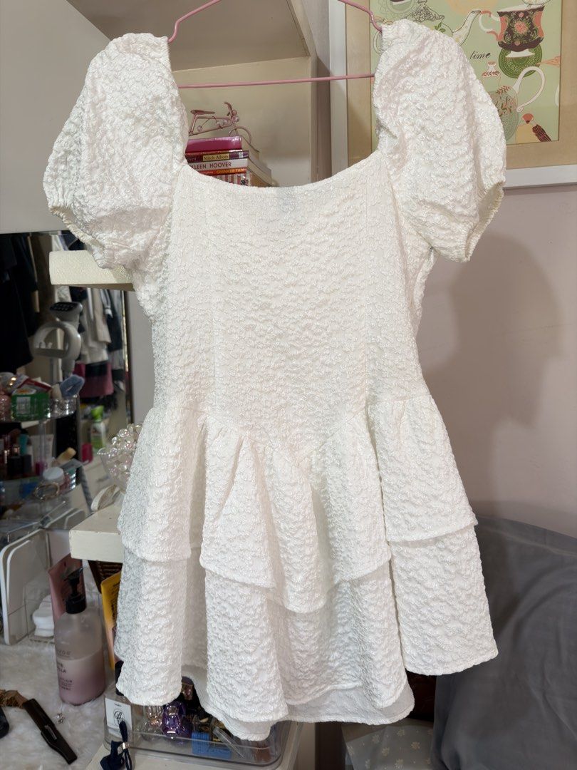 Shein White Puff Sleeve Dress (Category: Dresses) located in Apalit. Submitted by ic_declutter (Listing ID 1435591864, Image 2). Description: - Shein white dress - Features puff sleeves - Tiered skirt design - Square neckline - Size: M (EU 38, US 6) - Made in China.