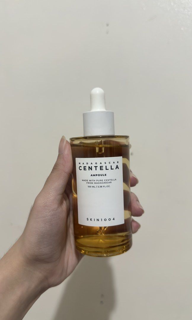 Skin1004 Madagascar Centella Ampoule 100ml (Category: Face Care) located in Bacoor. Submitted by decluttrdaily (Listing ID 1435593354, Image 1). Description: -buy a 200+ item in my shop and get this for free😊 -97% left - Expiration Date: August 2026 - no box pero will wrap in bubble naman to keep it safe❤️.