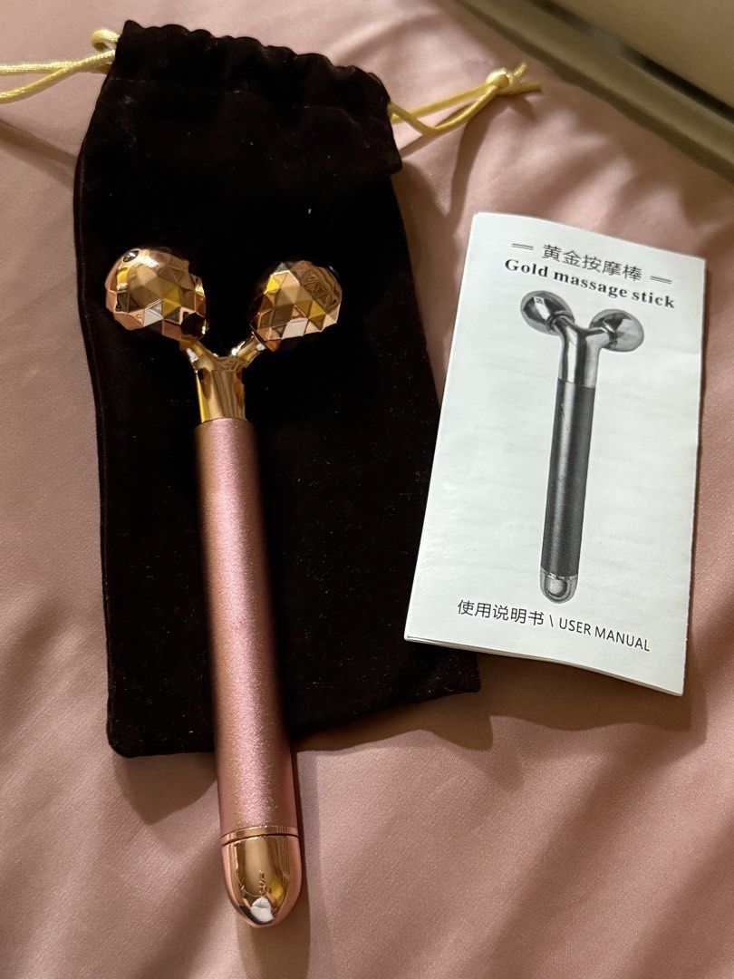 SKINdough Face Massage Roller (Category: Face Care) located in Pasig City. Submitted by cacishop (Listing ID 1435625667, Image 2). Description: Rose Gold No box AA Battery.