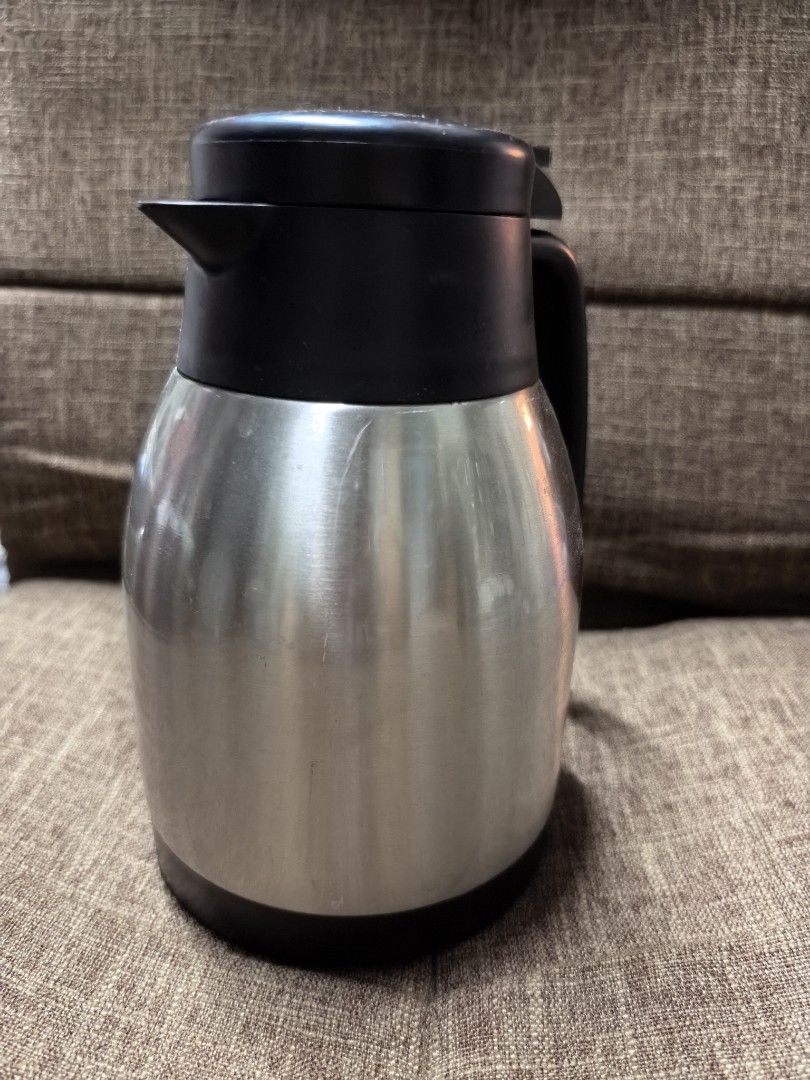 Stainless Steel Thermal Carafe (Category: Water Bottles & Tumblers) located in Rizal. Submitted by gkstcenit (Listing ID 1435611132, Image 2). Description: - Stainless steel thermal carafe - Keeps drinks hot or cold for hours - Features a black lid and handle - Sleek, modern design - Well-maintained condition - Ideal for coffee, tea, and other beverages - Perfect for home or office use.