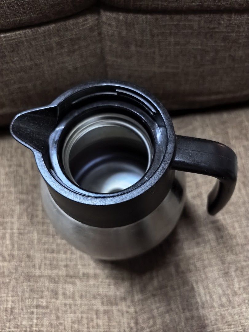 Stainless Steel Thermal Carafe (Category: Water Bottles & Tumblers) located in Rizal. Submitted by gkstcenit (Listing ID 1435611132, Image 3). Description: - Stainless steel thermal carafe - Keeps drinks hot or cold for hours - Features a black lid and handle - Sleek, modern design - Well-maintained condition - Ideal for coffee, tea, and other beverages - Perfect for home or office use.