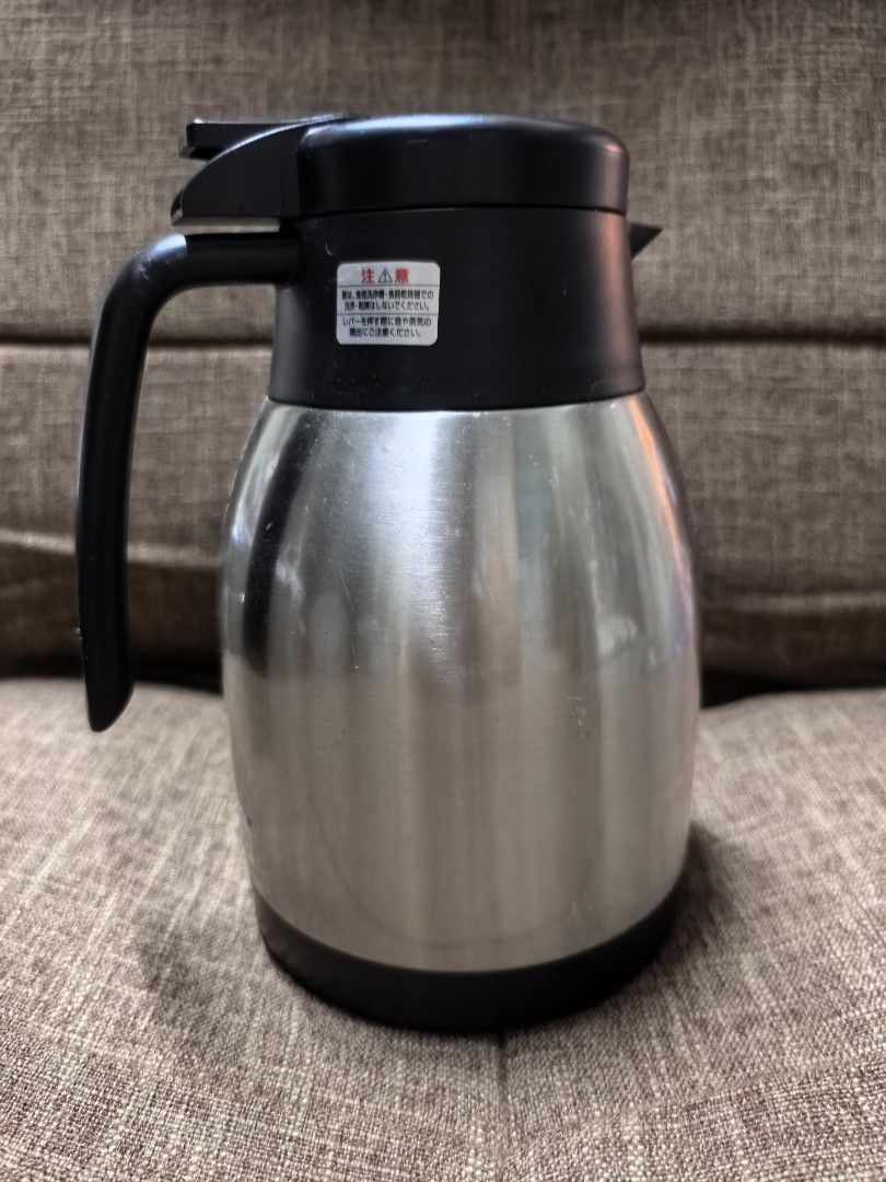 Stainless Steel Thermal Carafe (Category: Water Bottles & Tumblers) located in Rizal. Submitted by gkstcenit (Listing ID 1435611132, Image 1). Description: - Stainless steel thermal carafe - Keeps drinks hot or cold for hours - Features a black lid and handle - Sleek, modern design - Well-maintained condition - Ideal for coffee, tea, and other beverages - Perfect for home or office use.