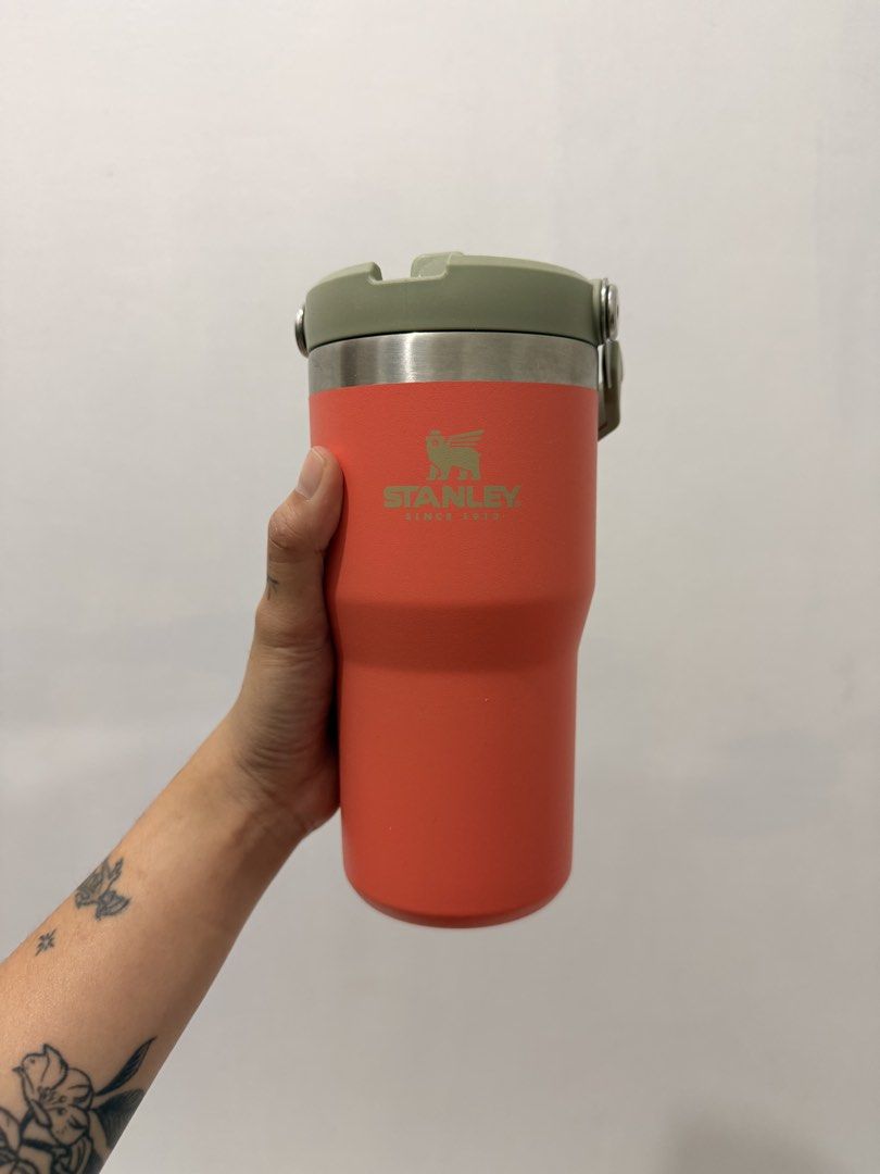 Stanley Go Tumbler (Category: Water Bottles & Tumblers) located in Bacolod City. Submitted by christine.vasquez14 (Listing ID 1435674859, Image 1). Description: - Coral Stanley Go Tumbler - Green lid - Stainless steel rim - Stanley logo on front.