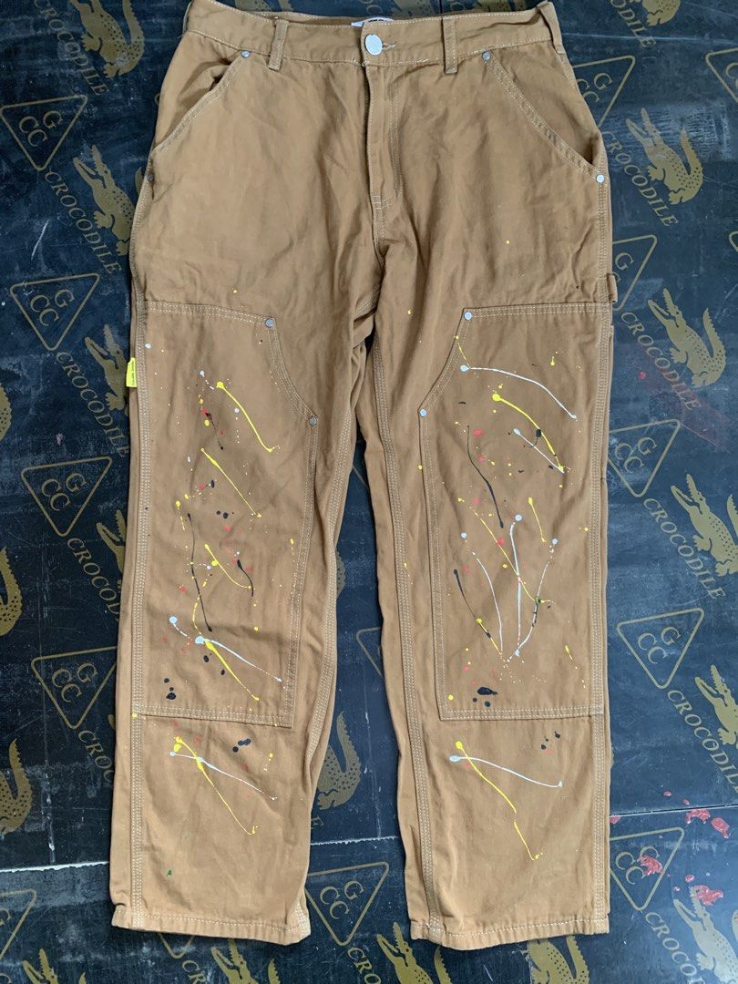 TBSM Trouble Smile Painter Pants (Category: Jeans) located in Baguio. Submitted by brix6699 (Listing ID 1435575866, Image 1). Description: - TBSM Trouble Smile painter pants - Color: Brown - Size: M - Paint splatter details on front - Multiple pockets - Yellow leather brand patch - Button closure with Trouble Smile logo - Two back pockets - Dimensions Length 37.5 inches Leg opening 8.5 inches Waist line 32 .