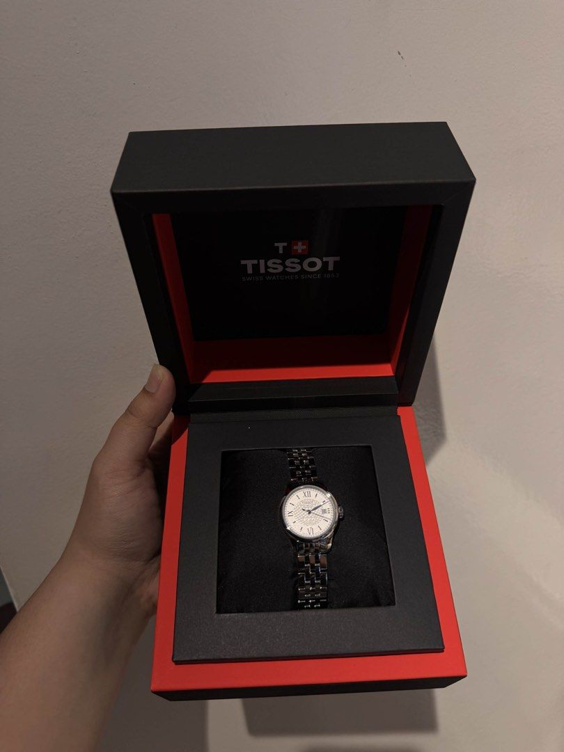 Tissot Carson Premium Automatic Watch (Category: Luxury Watches) located in Marilao. Submitted by anp129 (Listing ID 1435553189, Image 2). Description: - AUTHENTIC Tissot Le Locle Automatic T41.1.183.33 watch - Features a silver dial. - Roman numeral hour markers. - Date display at 3 o'clock. - Stainless steel bracelet and case. - Comes with original Tissot box. - Bought from Japan 🇯🇵 - Stylish and suitable for any occasion..