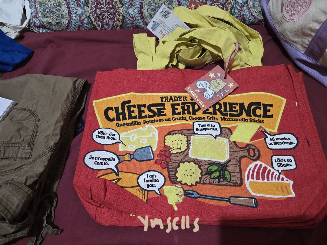 Trader Joe's Cheese Adventures Tote Bag (Category: Tote Bags) located in Mandaluyong City. Submitted by ymsells (Listing ID 1435655031, Image 2). Description: Trader Joe's canvas tote bag MINI PASTEL (PURPLE/LAVENDER, PINK, GREEN, BLUE) - PHP 650 LARGE PASTEL PURPLE/LAVENDER - PHP 850 CHEESE ADVENTURES (RED) - PHP 700 - ideal for groceries, books, or everyday use.
