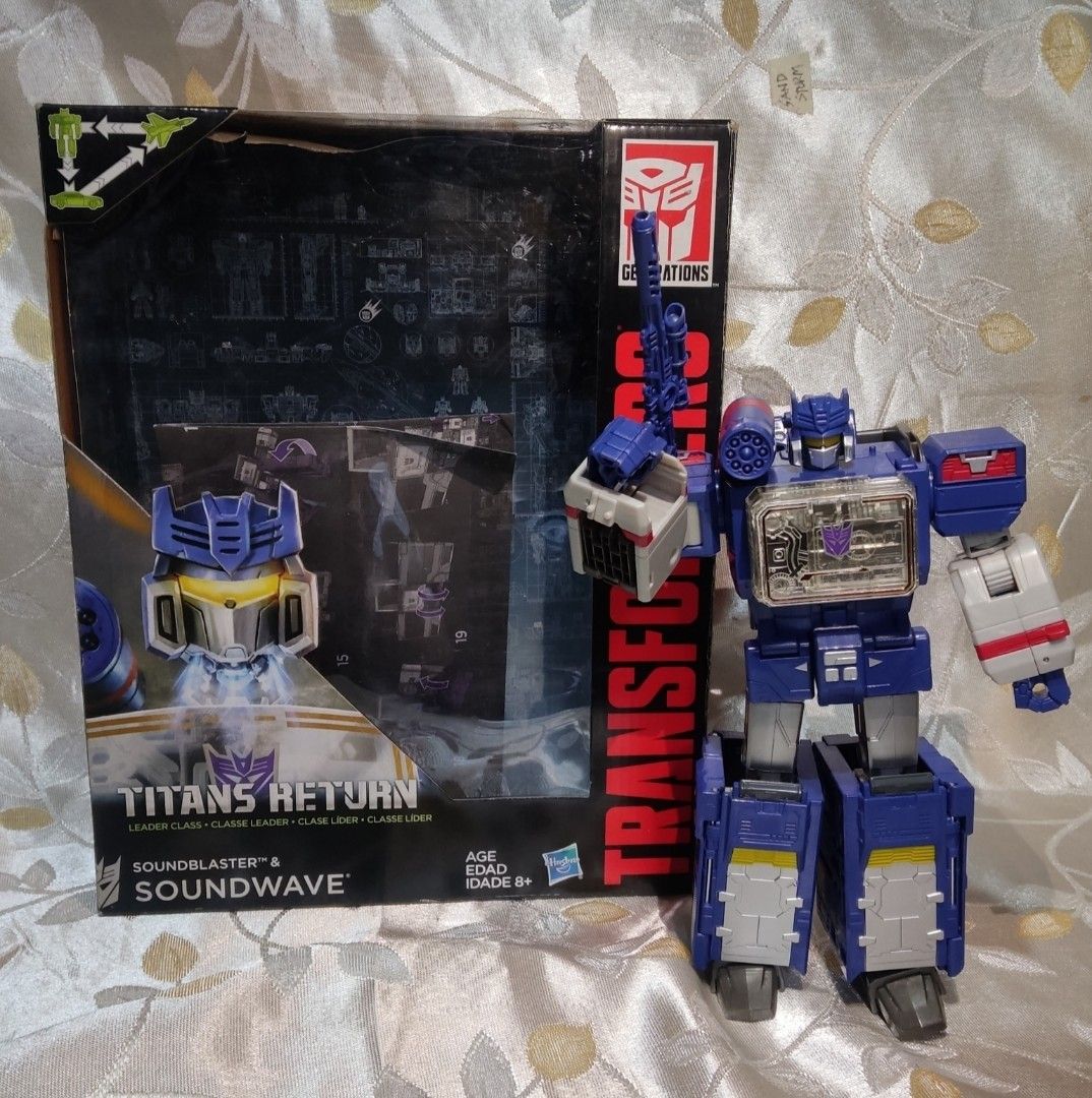 Transformers Titans Return Soundwave & Soundblaster (Category: Action & Battle Toys) located in Manila. Submitted by cvil1027 (Listing ID 1435561413, Image 1). Description: - Transformers Titans Return Soundwave & Soundblaster - Brand new, in original packaging - Includes: - Soundwave figure - Weapon - Headmaster figure - Box art features: - Soundwave - Headmaster - Transformers logo.