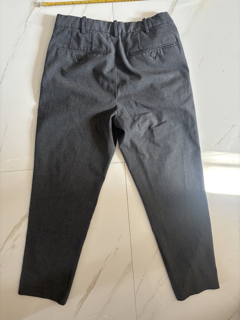 Uniqlo Gray Pants (Category: Other Bottoms) located in Baguio. Submitted by usedcondition (Listing ID 1435598151, Image 2). Description: - Uniqlo Gray Pants - Size: S - Waist: 68-76cm - Material: 67% Polyester, 29% Rayon, 4% Polyurethane - Cut: Straight - Length: Approximately 95cm - Features: Two front pockets, two back pockets.
