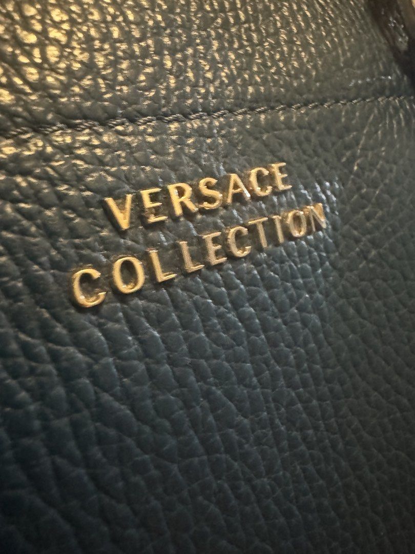 Versace Collection (Category: Luxury Bags & Wallets) located in Cagayan de Oro. Submitted by KoaApparelAtbp. (Listing ID 1435658952, Image 2). Description: Laptop/messenger bag, has sling slot but no sling. Fit laptop, files and more. No scratch, dents or color fade..