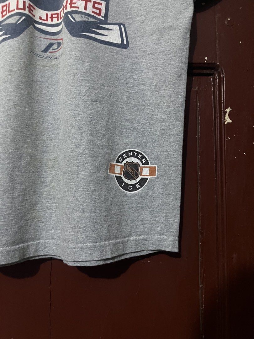 Vintage NHL Columbus Blue Jacket Team (Category: Tshirts & Polo Shirts ) located in San Pedro. Submitted by re_value.ph (Listing ID 1435674444, Image 3). Description: VINTAGE NHL size: Tall Medium Excellent condi issue: minor color transfer sa lettering ng “Columbus” SOLID neck line solid fittings.