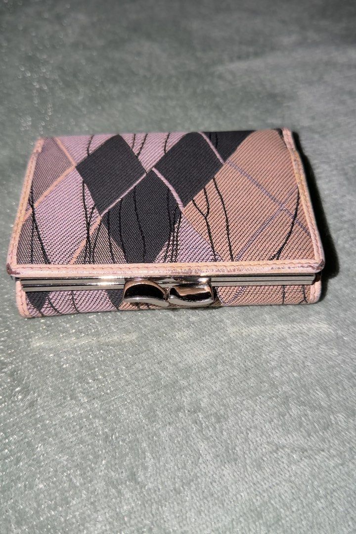 Vivienne Westwood Tri-fold Wallet (Category: Luxury Bags & Wallets) located in Makati City. Submitted by joshdelrey (Listing ID 1435702225, Image 3). Description: Vivienne Westwood Trifold Wallet - Negotiable - Needs Repainting - Makati .