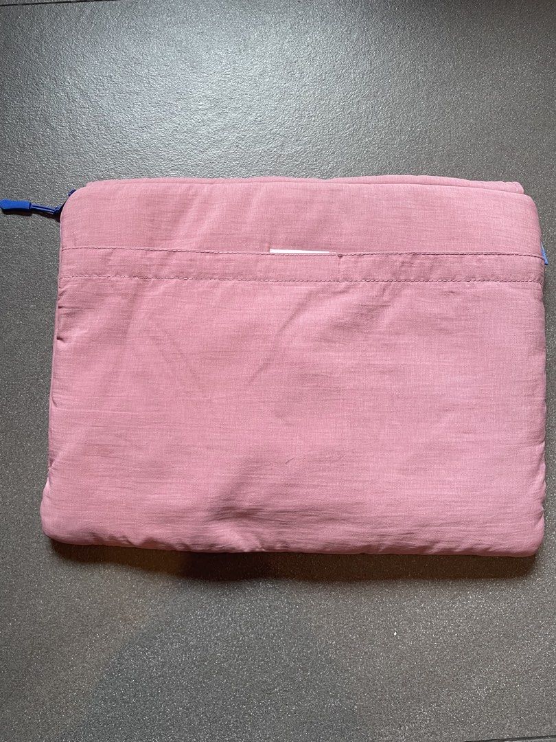 Wallts Laptop Bag (Category: Laptop Bags & Sleeves) located in Quezon City. Submitted by iggyclothes_ (Listing ID 1435533788, Image 2). Description: Wallts Laptop Bag/Pouch - with hand insert and other pockets - barely used - fits 13 inch laptop - pink - rfs: don’t use.