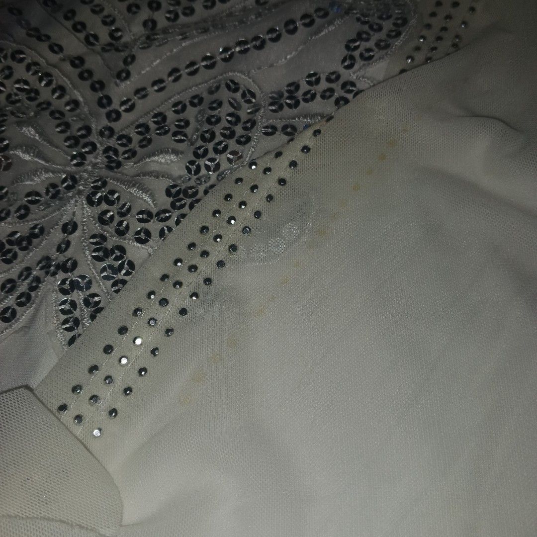 White Sequin Blouse Top (Category: Blouses) located in Antipolo. Submitted by cheezeka (Listing ID 1435630132, Image 2). Description: Size: Medium - Brand: Vimie - White top - Sequin butterfly on neckline - Ruched detail on the front - Short-sleeved Location: Antipolo, Rizal Payment: Gcash Shipping: J&T.