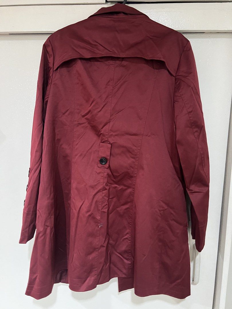 Women's Trench Coat Maroon (Category: Coats, Jackets and Outerwear) located in Quezon City. Submitted by celsnts (Listing ID 1435532107, Image 3). Description: Used once LIKE NEW, absolutely no flaws and stains Washed already and stored Size fits best on M (can be for small or semi large) Location: QC.