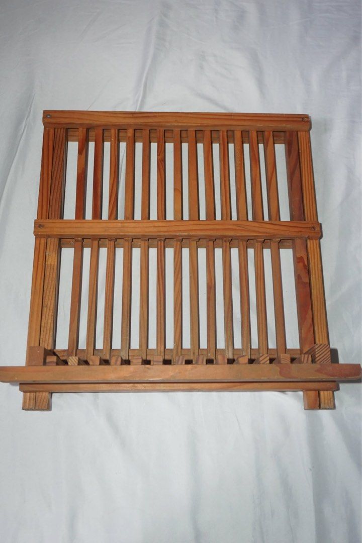 Wooden Dish Rack (Category: Other Kitchenware & Tableware) located in Antipolo. Submitted by ttrends (Listing ID 1435625157, Image 3). Description: - Wooden dish rack - Two-tiered design - Multiple slots for plates and bowls - Natural wood finish - Foldable for easy storage - FREE tissue box and wooden tissue roll holder included!.