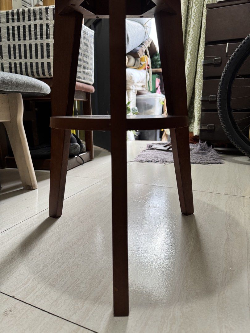 Wooden Side Table with Shelf (Category: Tables & Sets) located in Quezon City. Submitted by elektra0111 (Listing ID 1435713943, Image 2). Description: - Round tabletop - Lower shelf for storage - Classic design with angled legs - Warm brown finish - Versatile use: bedside table, accent piece - Practical and stylish - dimensions of the table Diameter 40cm Height 54cm.