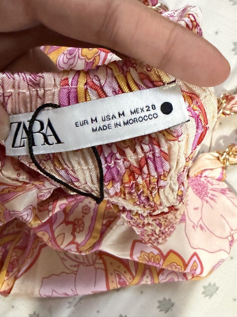 Zara Floral Chain Strap Top (Category: Sleeveless) located in Apalit. Submitted by ic_declutter (Listing ID 1435615238, Image 3). Description: - Zara floral print top - Features chain straps - Sweetheart neckline - Comfortable smocked back - Size: M - Made in Morocco.