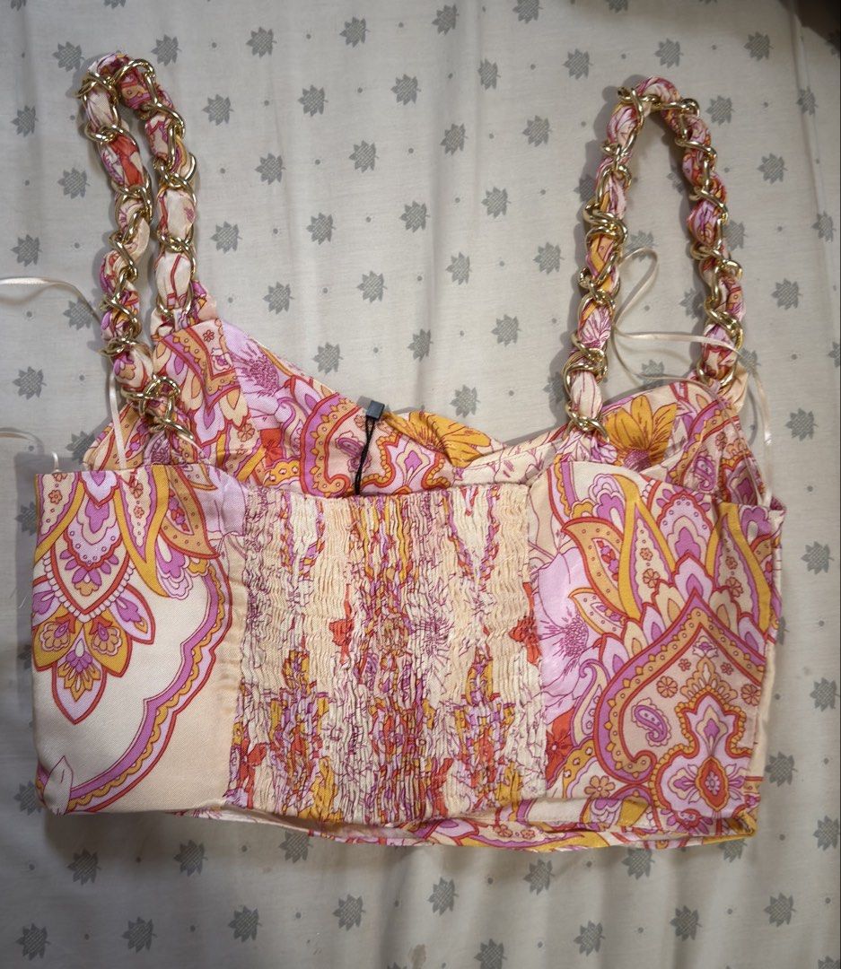 Zara Floral Chain Strap Top (Category: Sleeveless) located in Apalit. Submitted by ic_declutter (Listing ID 1435615238, Image 2). Description: - Zara floral print top - Features chain straps - Sweetheart neckline - Comfortable smocked back - Size: M - Made in Morocco.