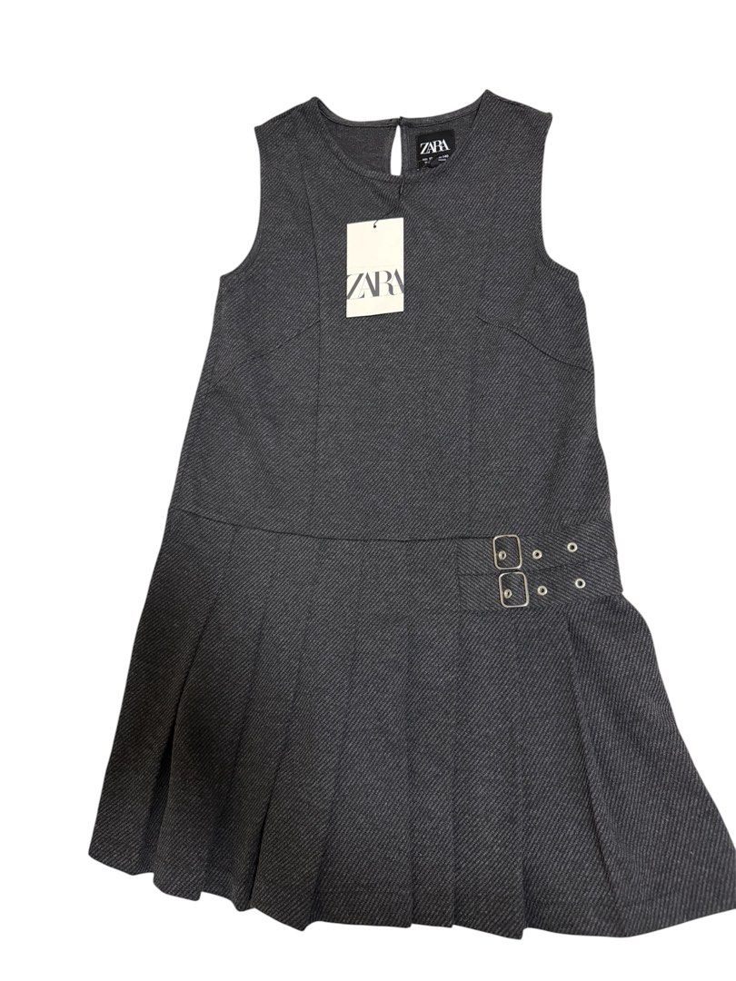 Zara Gray Pleated Dress (Category: Babies & Kids Fashion) located in Quezon City. Submitted by mcva2 (Listing ID 1435533281, Image 1). Description: - Zara gray dress - Pleated skirt - Sleeveless - Round neckline - Keyhole back - Side buckles - Size 10, 140cm height - Made in Morocco.