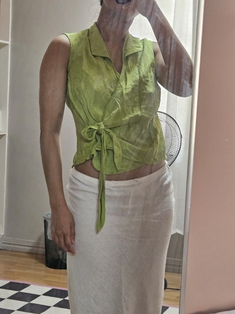 100% silk vintage top (Category: Blouses) located in Quezon City. Submitted by cheapbrandy (Listing ID 1438952440, Image 1). Description: absolutely stunning vintage silk top in apple green. amazing fabric in 100% silk (rare for this price). been keeping this forever but never wore.
