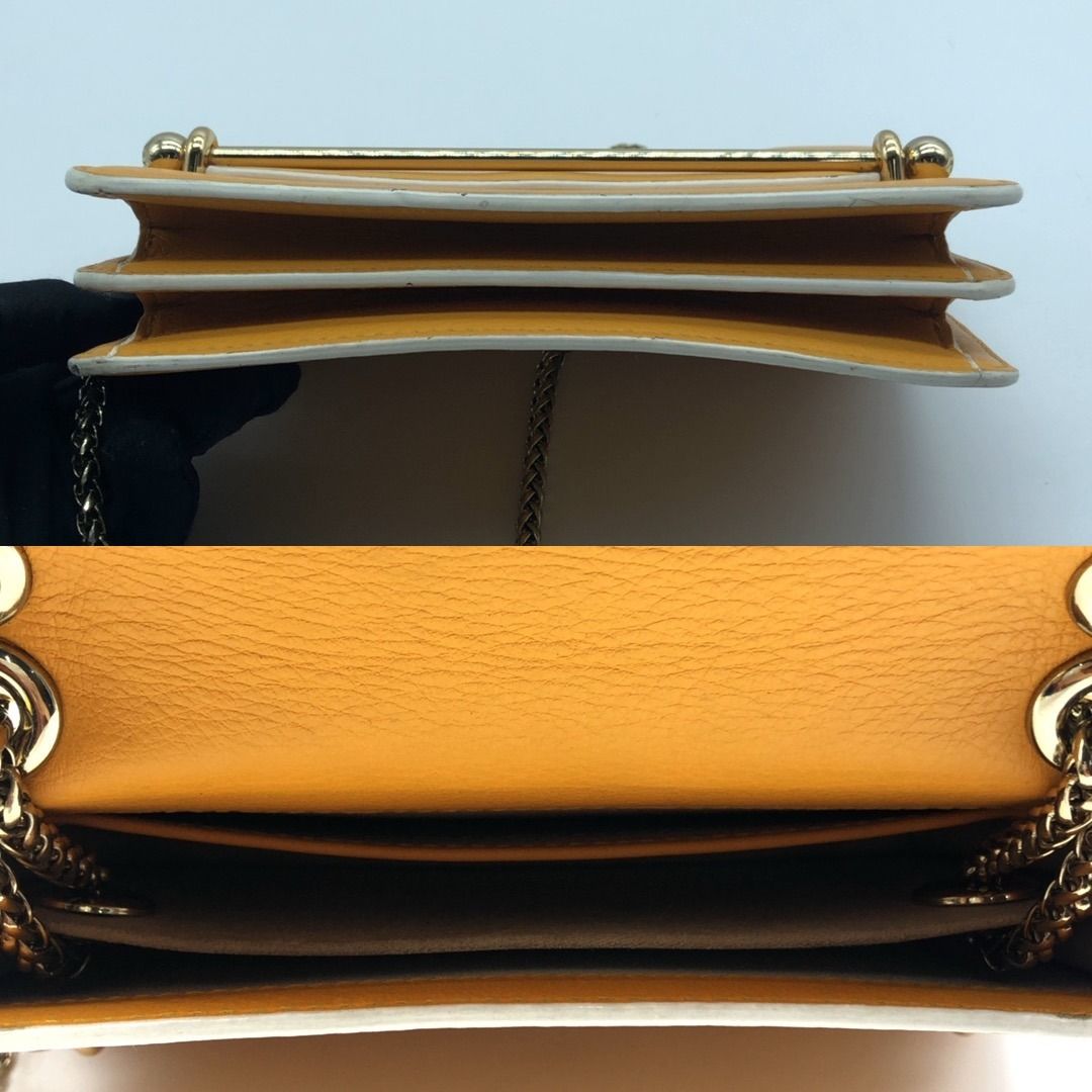 267004245 SRATHBERRY BAG BAG YELLOW (Category: Luxury Bags & Wallets) located in Taguig. Submitted by ecoring.ph (Listing ID 1438899151, Image 3). Description: ◆CONDITION: B- ◆DESCRIPTIONS: (Other defects/info:) OUTER: The body of the bag is scratched, scuffed, has press marks, is wrinkled, has minimal stains and dirt, and shows signs of use. The rubber lining of the bag is scratched, scuffed, stained, dirty, cracked, chipped, has press marks, an