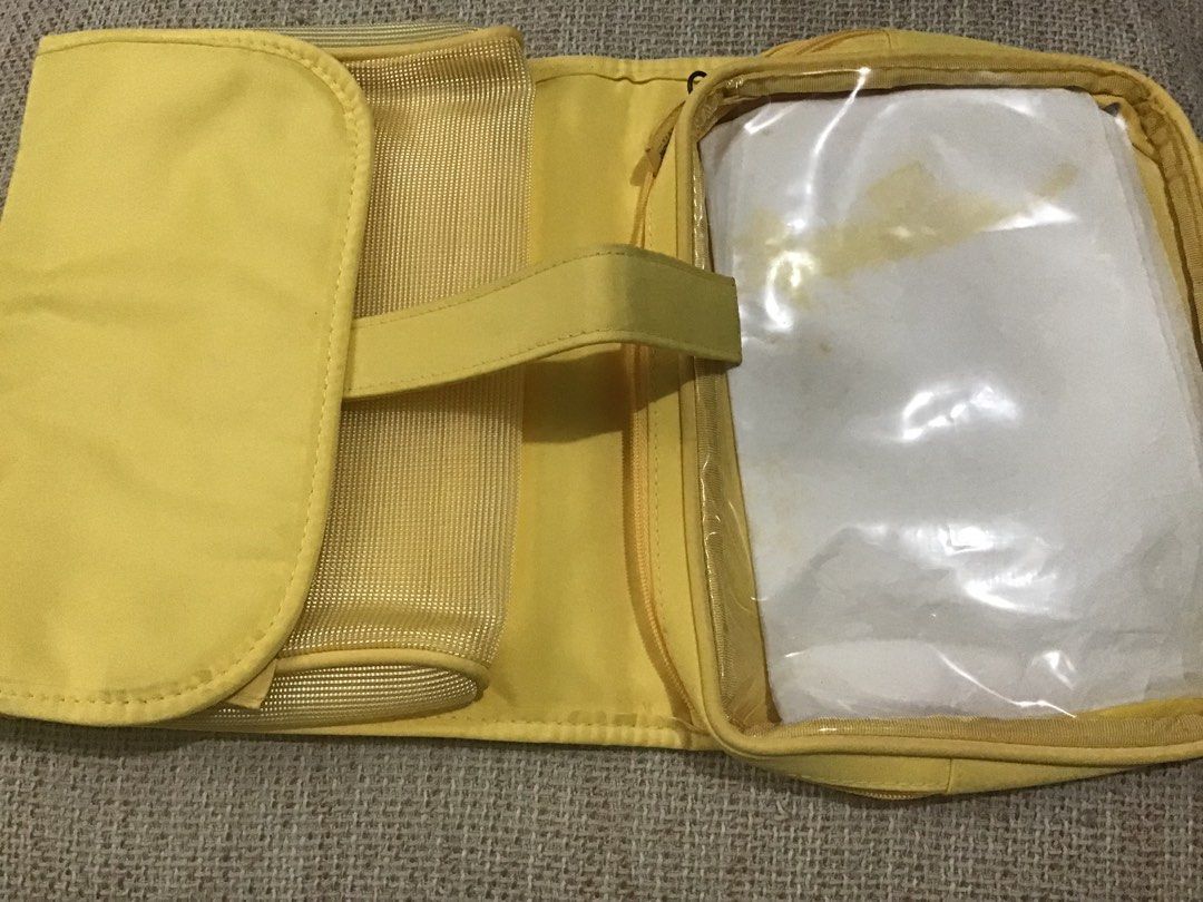 3 fold toiletry pouch (Category: Bath) located in Manila. Submitted by carou35896 (Listing ID 1439006473, Image 1). Description: with stain on the plastic.