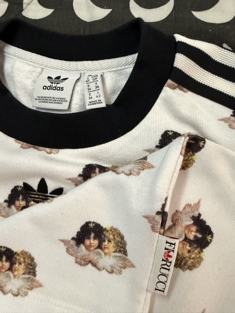 Adidas all over print fiorucci (Category: Shirts) located in Malabon City. Submitted by splendidcloset (Listing ID 1438891235, Image 3). Description: .