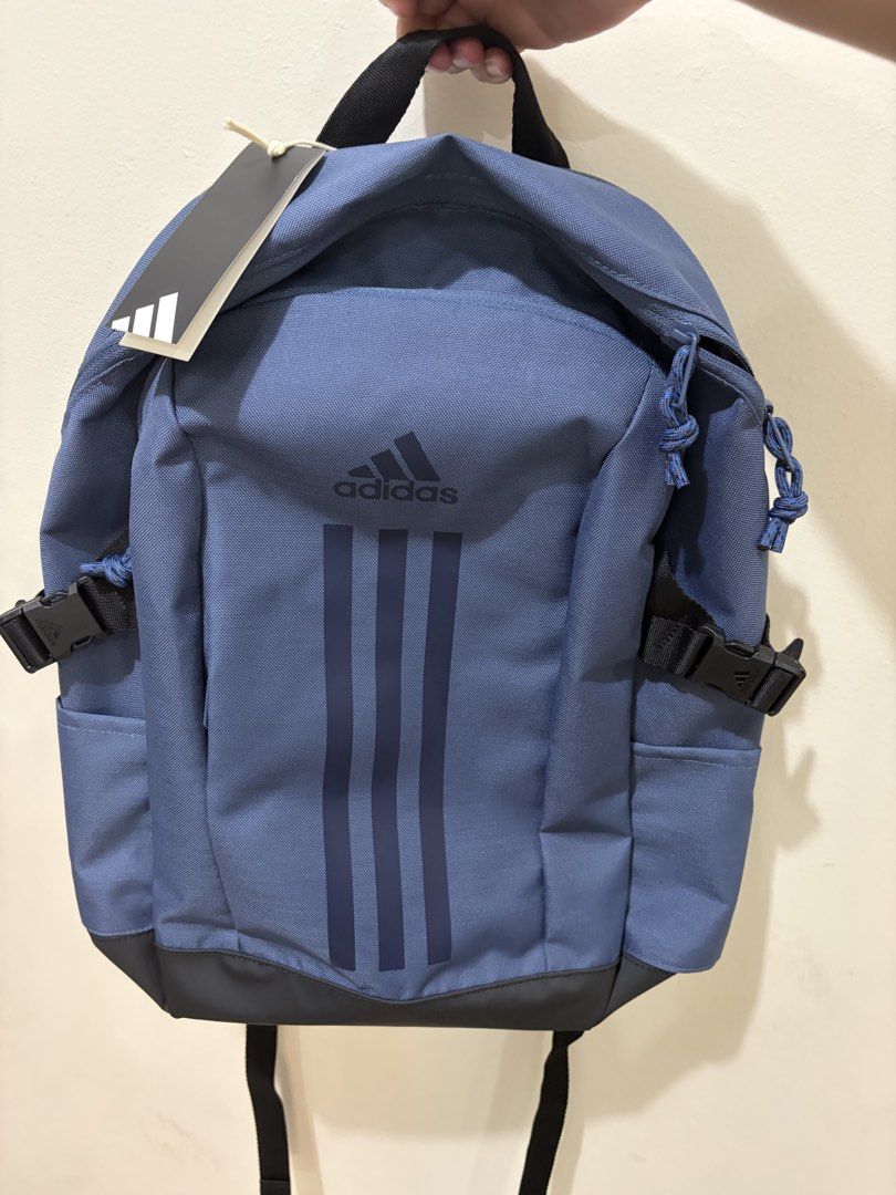 Adidas Power VII Backpack (Category: Backpacks) located in Las Pinas. Submitted by bellagirl28 (Listing ID 1438919635, Image 1). Description: Adidas Power VII backpack is a stylish and functional choice. Its a practical backpack with laptop compartment. It features the iconic Adidas logo and three stripes design. The backpack has a main compartment and side pockets. The tag shows the original price of PHP 2,000. The backpack is in a blue color. D